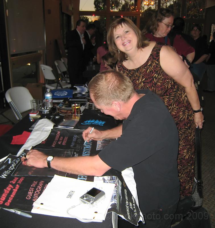 IMG_0120.jpg - Vaughn Armstrong (Enterprises "Admiral Forrest")  signs an autograph with Aunt Vickie.http://en.wikipedia.org/wiki/Vaughn_Armstrong